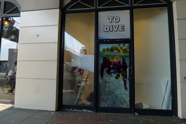 The store wrap being applied The store wrap being applied