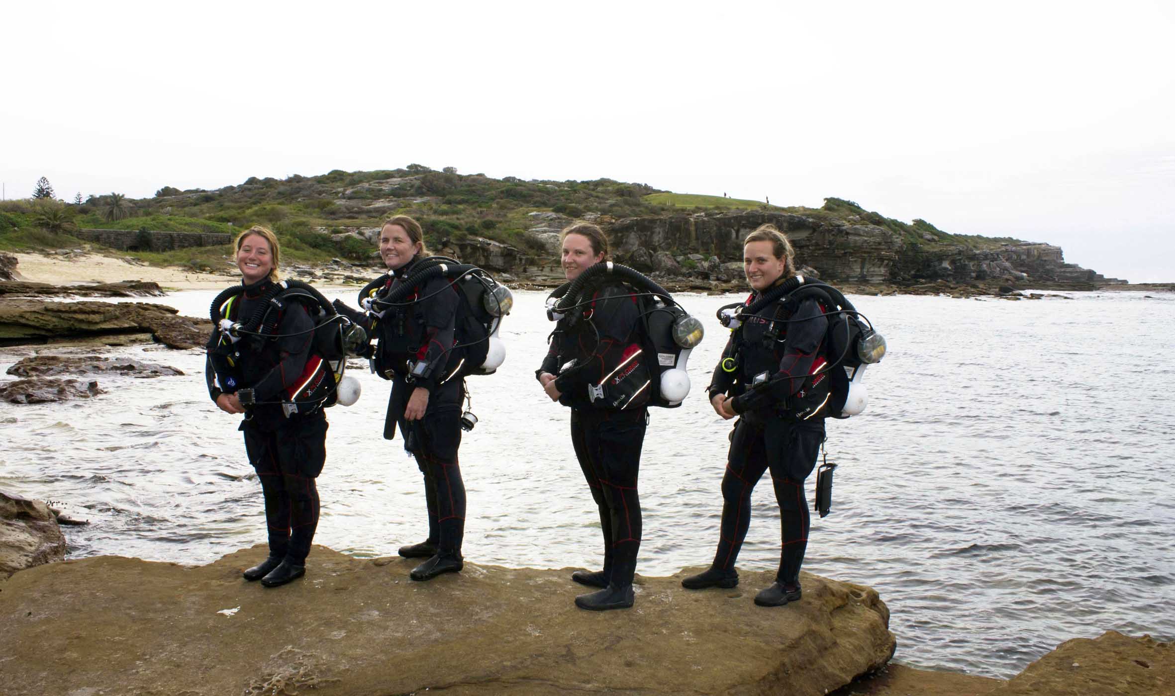 Rachael Fallon, PADI Course Director Peter Letts, Samantha Patterson-Ross, Andrea Payne, PADI Course Director Jamie Miller and Leah Hurley.