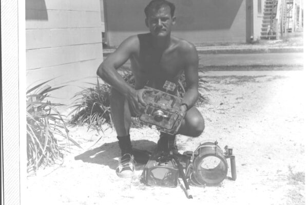 Durwood J. (DJ) Morin with an underwater camera