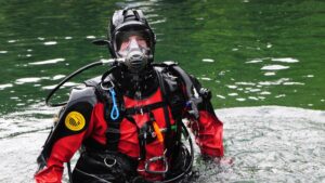 a public safety diver exits the water