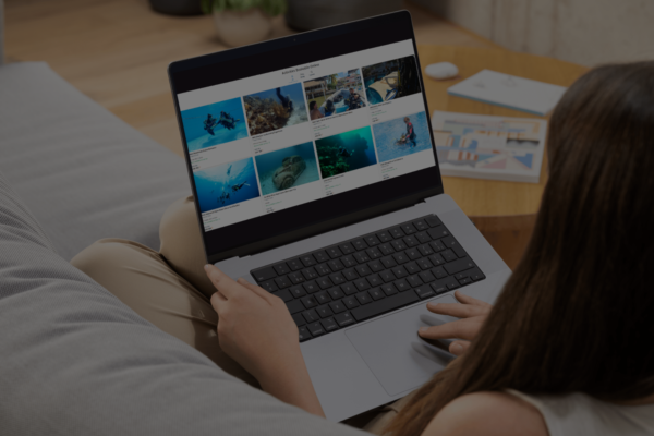 PADI Adventures Widget on the laptop screen