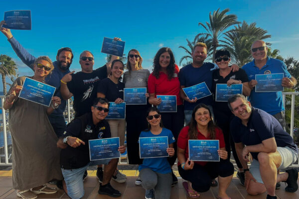 padi business school graduates with their certificates