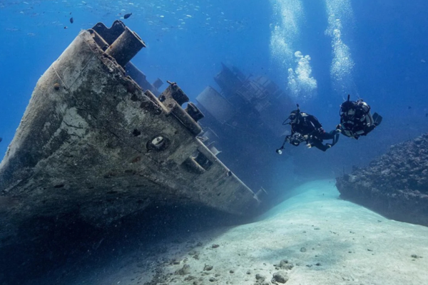 Two divers exploring the wreck