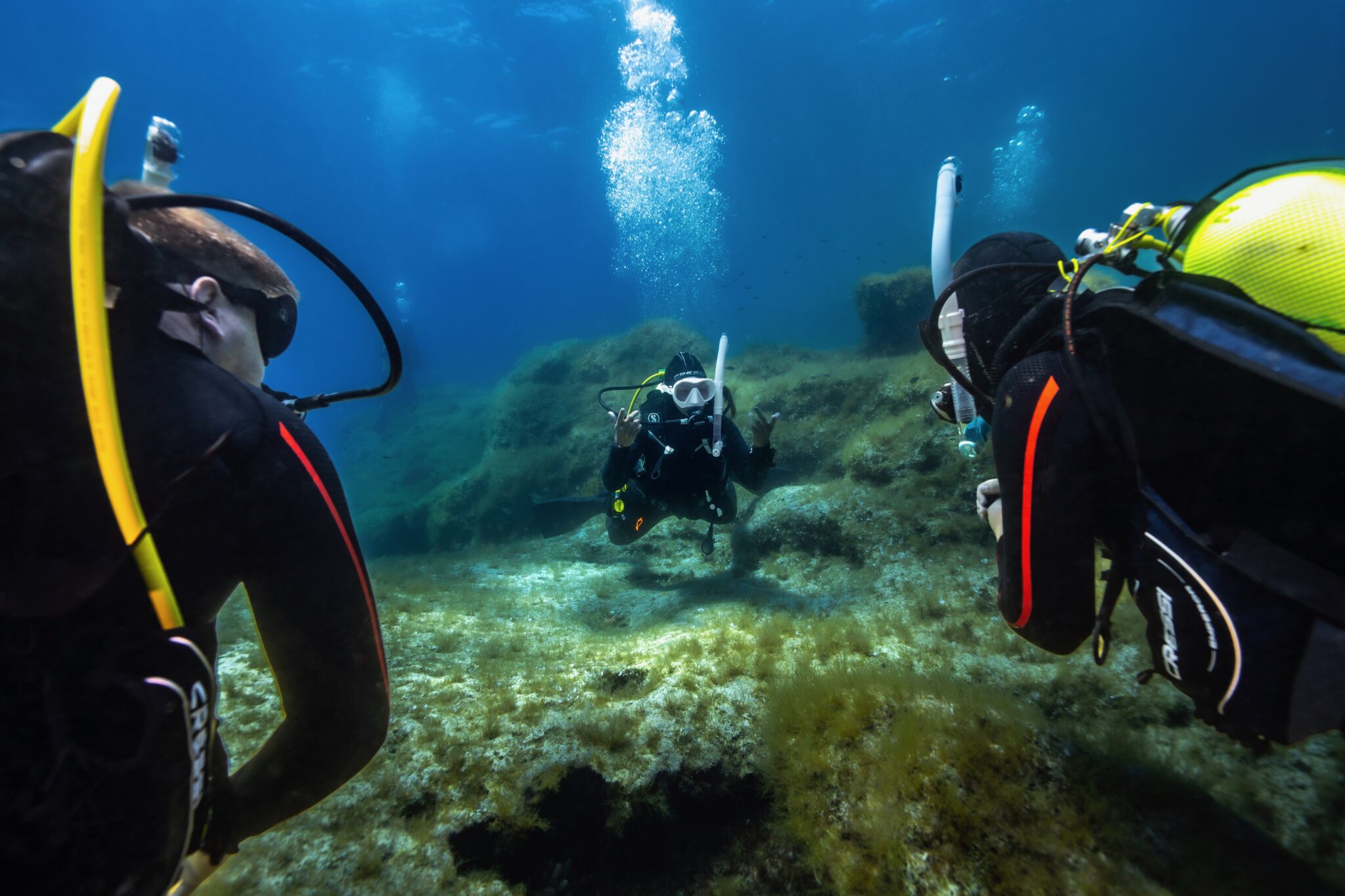 two divers take a class with a PADI Instructor in Malta